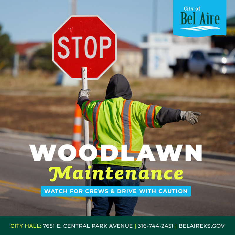 Road work flagger holding a sign that says stop directing traffic